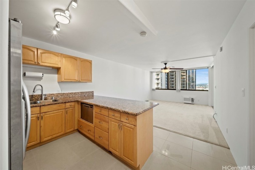 Located in the heart of downtown Honolulu stands Kukui Plaza - Beach Condo for sale in Honolulu, Hawaii on Beachhouse.com