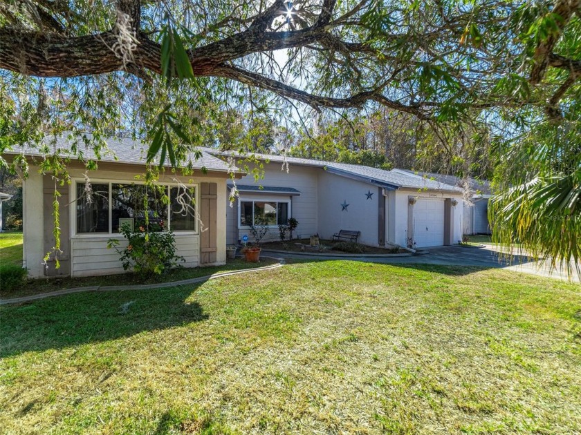 This unique 1 story home located in the desirable Beacon Woods - Beach Home for sale in Hudson, Florida on Beachhouse.com