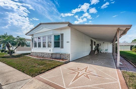 Beautifully maintained 55+ community.  Large Lake where you can - Beach Home for sale in Holiday, Florida on Beachhouse.com