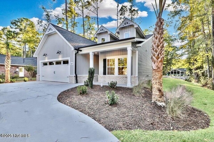 Discover a home that flawlessly blends modern sophistication - Beach Home for sale in Carolina Shores, North Carolina on Beachhouse.com