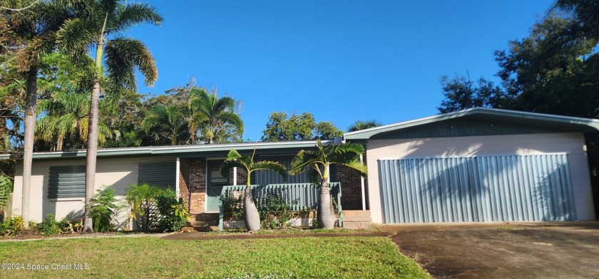 A FIXER-UPPER'S DREAM AWAITS! Are you ready to turn a house into - Beach Home for sale in Merritt Island, Florida on Beachhouse.com