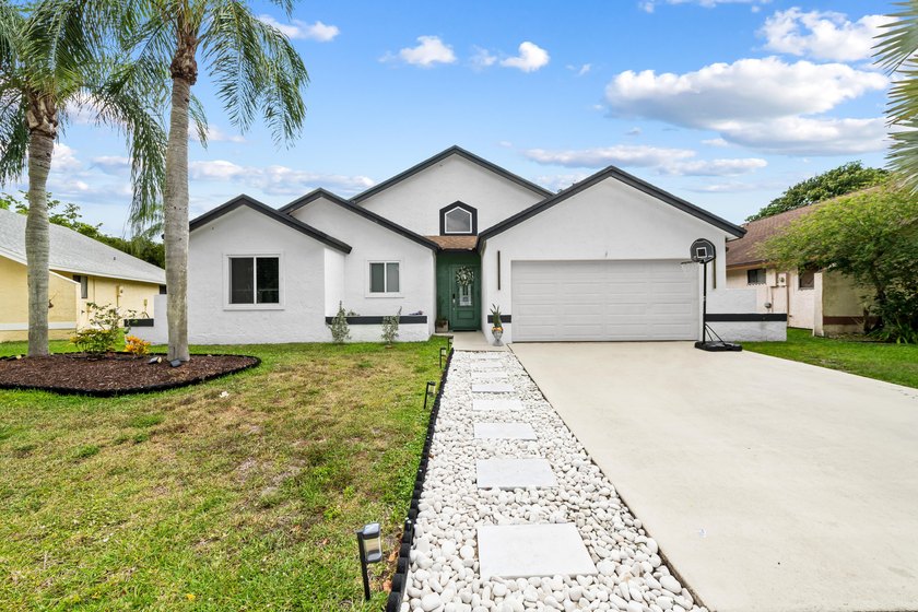 Welcome to this beautifully updated 3-bedroom, 2-bathroom - Beach Home for sale in Boca Raton, Florida on Beachhouse.com