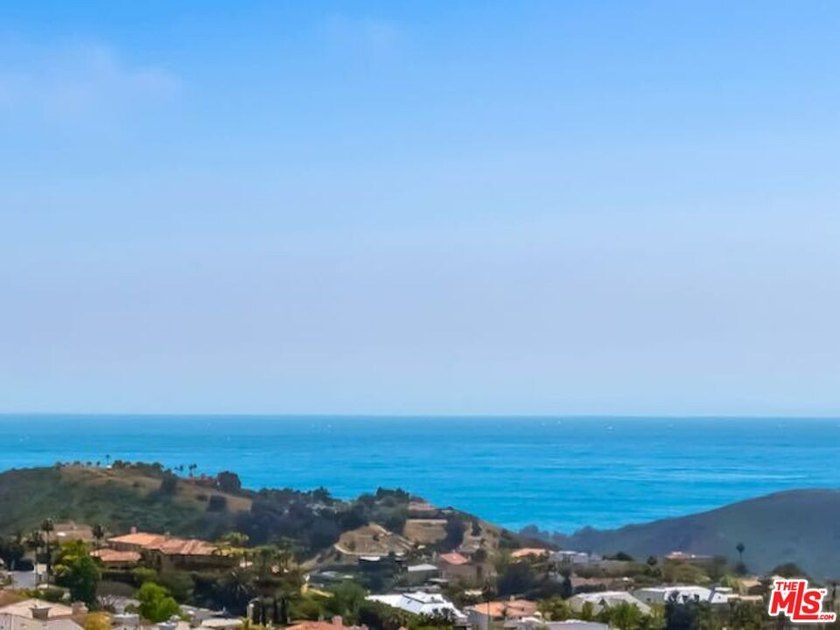 Commanding a premier position with head-on ocean and mountain - Beach Lot for sale in Pacific Palisades, California on Beachhouse.com
