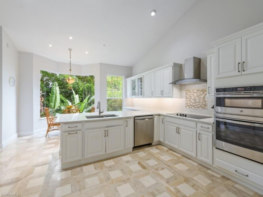 Welcome to this beautifully appointed second-floor condominium - Beach Home for sale in Naples, Florida on Beachhouse.com