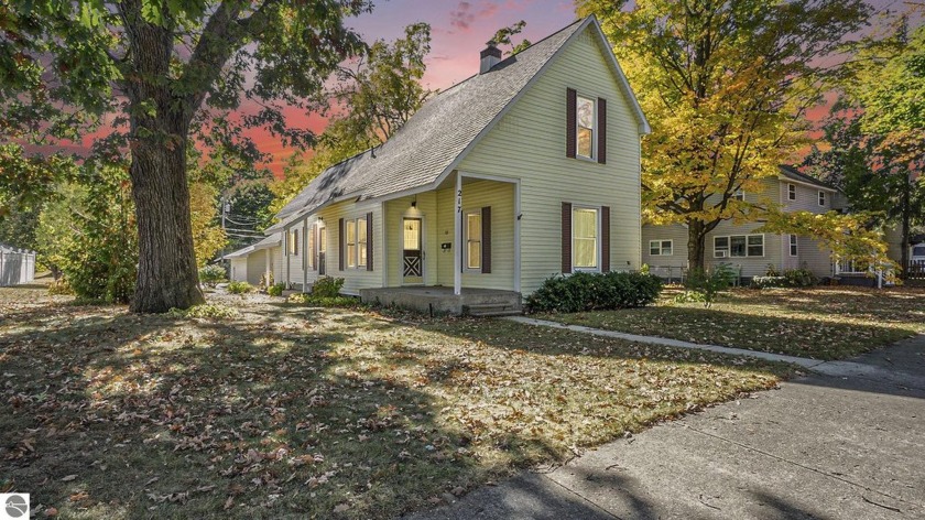 Opportunity awaits you at this lovely 1.5 story bungalow located - Beach Home for sale in Traverse City, Michigan on Beachhouse.com