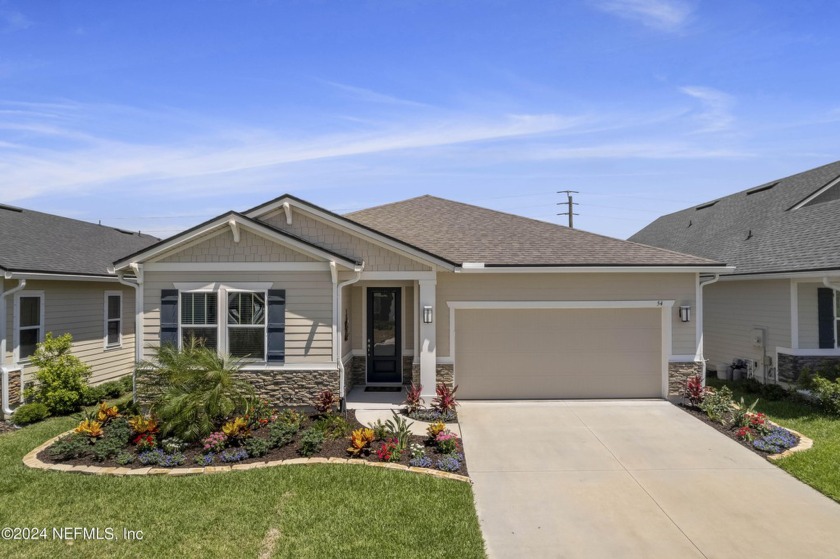 Welcome Home! Built in 2021, this immaculate residence offers a - Beach Home for sale in Palm Coast, Florida on Beachhouse.com