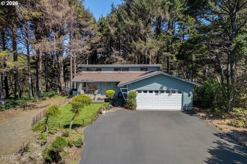 Tucked among the trees in the sought-after Pacific Shores - Beach Home for sale in South Beach, Oregon on Beachhouse.com