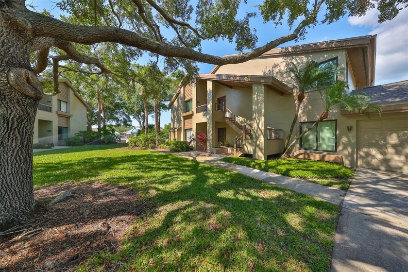 Welcome home to this beautiful 3 bedroom 2 bath condo tucked - Beach Condo for sale in Palm Harbor, Florida on Beachhouse.com