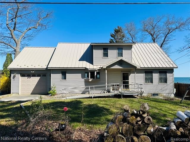 Year-Round Living with Breathtaking Views & 75 feet of Frontage - Beach Home for sale in East Tawas, Michigan on Beachhouse.com
