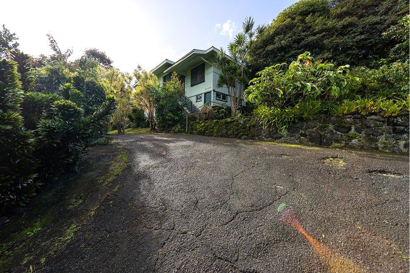 Embrace the charm of Old Hawaii in this classic plantation-style - Beach Home for sale in Laupahoehoe, Hawaii on Beachhouse.com