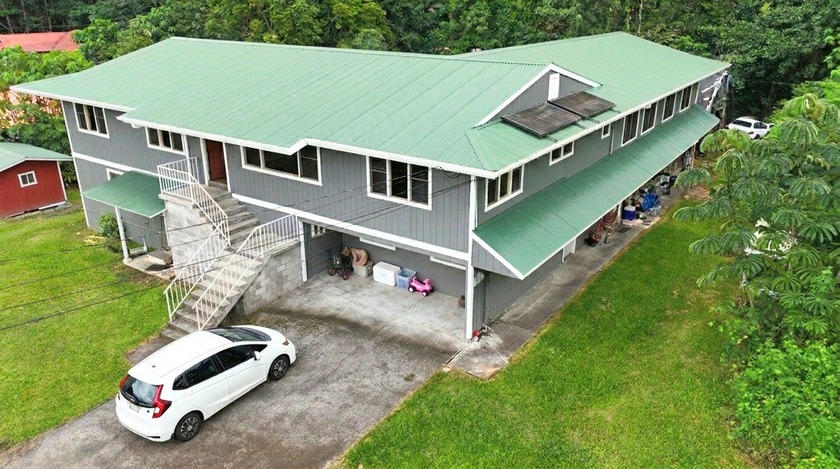 Pahoa Village: Large 2-Story Family Home Location: Post Office - Beach Home for sale in Pahoa, Hawaii on Beachhouse.com