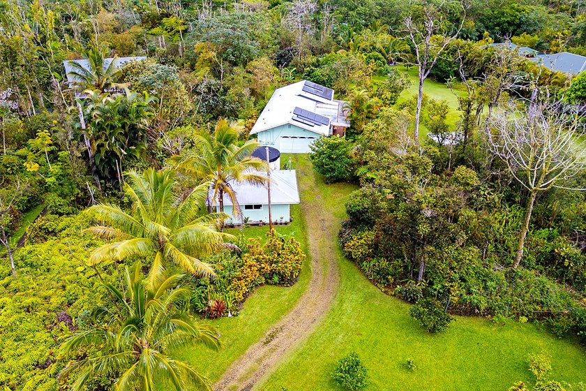 Tucked away in lush tropical foliage this well-built 3-bedroom - Beach Home for sale in Pahoa, Hawaii on Beachhouse.com