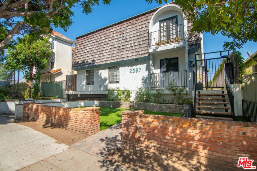 On a quiet, tree-lined street in Sunset Park, this 3 bedroom/2.5 - Beach Condo for sale in Santa Monica, California on Beachhouse.com