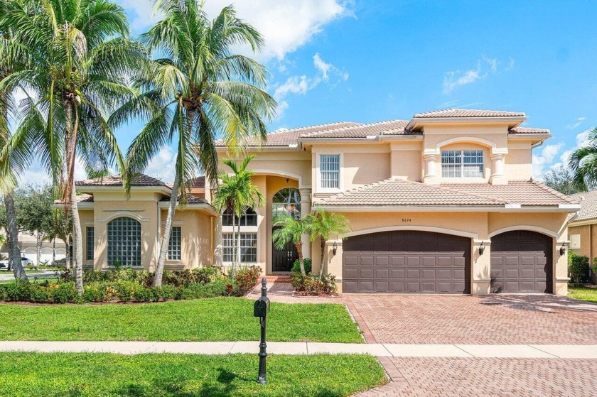 Nestled in the highly sought-after community of Canyon Lakes - Beach Home for sale in Boynton Beach, Florida on Beachhouse.com