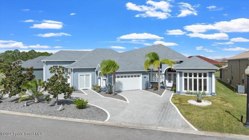 Discover your dream oasis in the heart of Hidden Lakes, nestled - Beach Home for sale in Titusville, Florida on Beachhouse.com