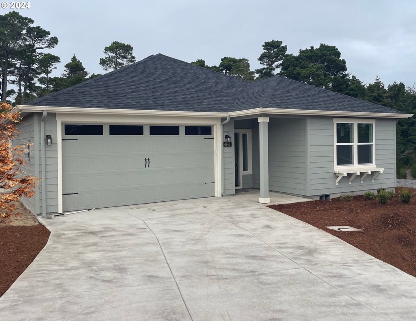 This stunning new home offers 1,914 square feet of thoughtfully - Beach Home for sale in Florence, Oregon on Beachhouse.com