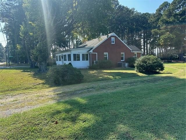 This home lives large!   Charming brick house Located just one - Beach Home for sale in Gwynn, Virginia on Beachhouse.com