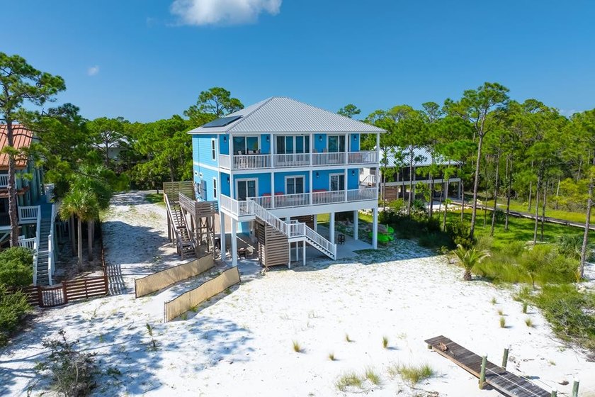 Welcome to your private coastal retreat-this custom-built - Beach Home for sale in St. George Island, Florida on Beachhouse.com