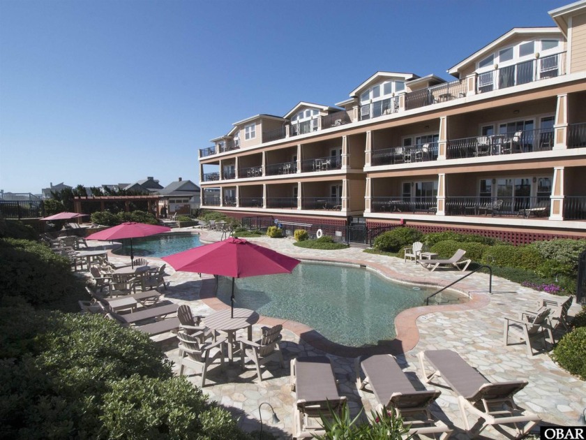 Wake up to breathtaking ocean views from this stunning 3-bedroom - Beach Condo for sale in Kill Devil Hills, North Carolina on Beachhouse.com