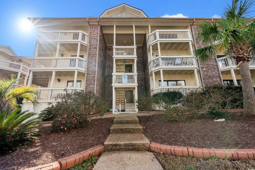 Nestled just a short stroll from the beach, this inviting - Beach Condo for sale in Myrtle Beach, South Carolina on Beachhouse.com