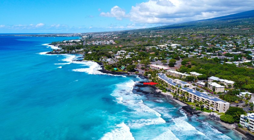 From your private lanai overlooking the Pacific Ocean, watch - Beach Condo for sale in Kailua Kona, Hawaii on Beachhouse.com