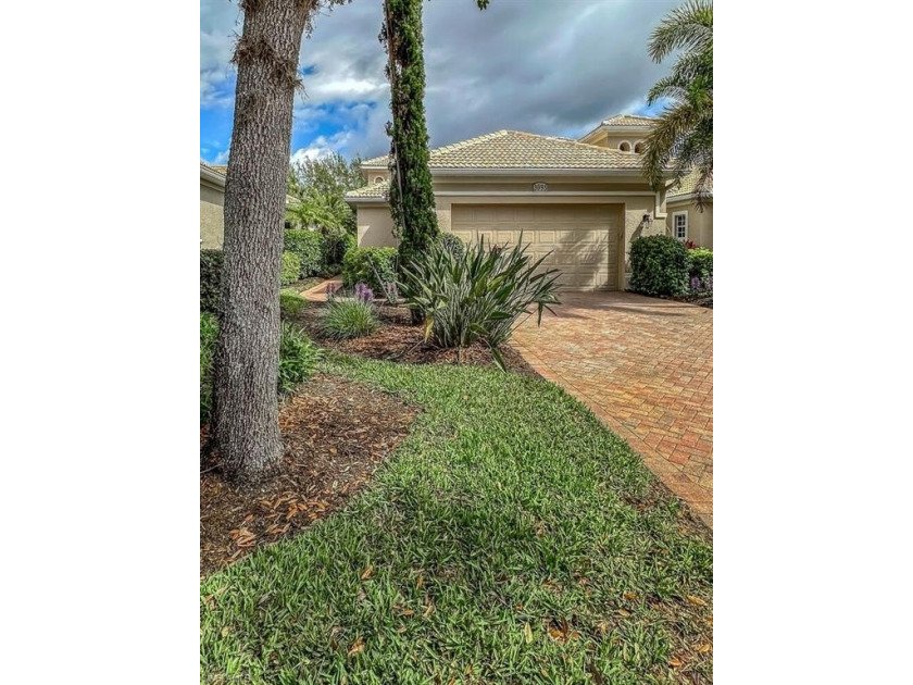 Located in the upscale gated community of Olde Cypress is this - Beach Home for sale in Naples, Florida on Beachhouse.com