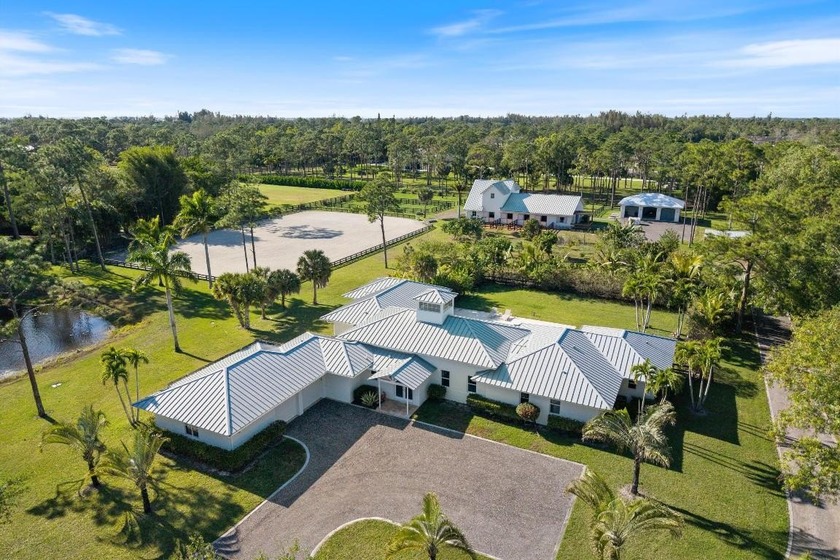Nestled in the serene, gated equestrian community of Homeland - Beach Home for sale in Lake Worth, Florida on Beachhouse.com