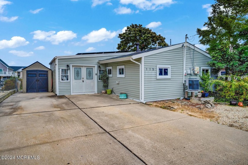 This 3-bedroom, 2-bath waterfront home offers the perfect blend - Beach Home for sale in Little Egg Harbor, New Jersey on Beachhouse.com