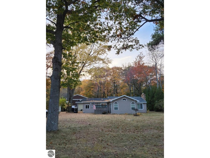 Catch a Lake Huron breeze as you enjoy this up-north property - Beach Home for sale in Oscoda, Michigan on Beachhouse.com