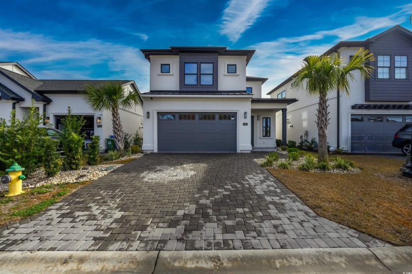 Nestled in a serene gated community with breathtaking views of a - Beach Home for sale in Myrtle Beach, South Carolina on Beachhouse.com