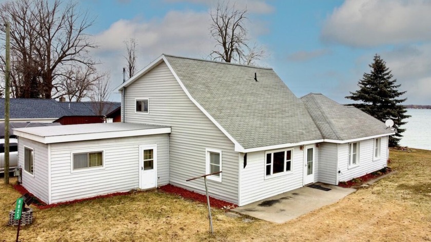 Nestled in a prime location with an impressive 91ft of frontage - Beach Home for sale in Alpena, Michigan on Beachhouse.com