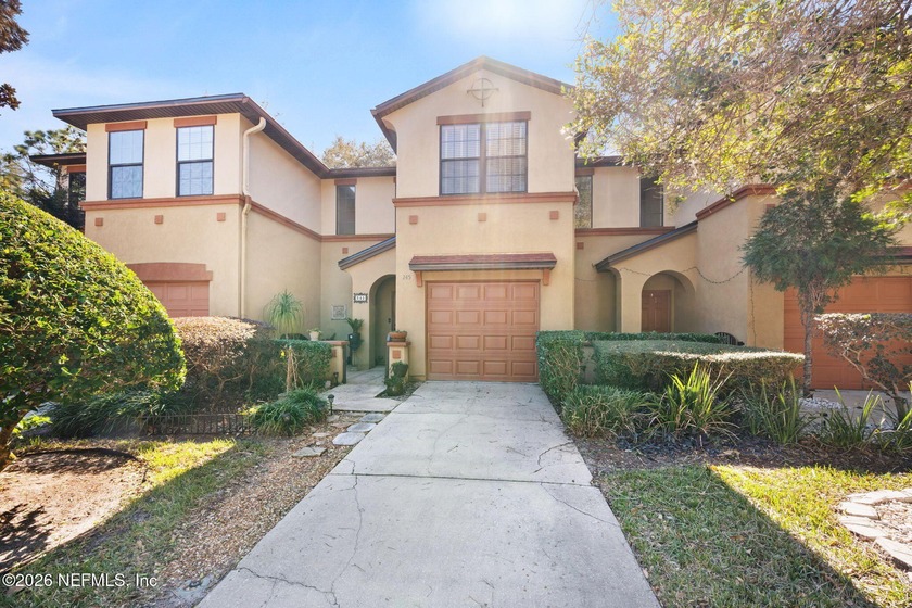 Welcome home to this beautifully designed Spanish-style townhome - Beach Condo for sale in Saint Johns, Florida on Beachhouse.com