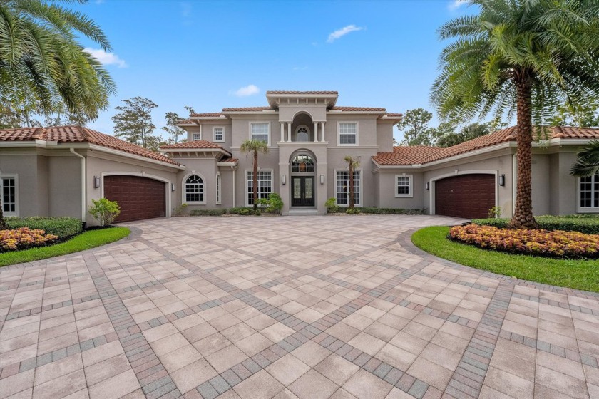 Located on a sprawling 1+acre lot, this exquisite home, built in - Beach Home for sale in Wellington, Florida on Beachhouse.com