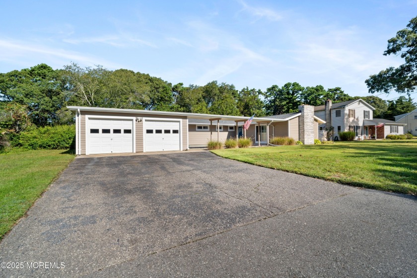 This charming 3-bedroom, 2-bathroom home is perfectly situated - Beach Home for sale in Little Egg Harbor, New Jersey on Beachhouse.com