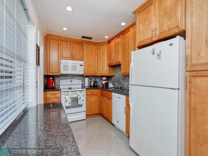 55+REMODELED. KITCHEN WITH STUNNING REAL WOOD TALL CABINETS & - Beach Condo for sale in Lauderdale Lakes, Florida on Beachhouse.com
