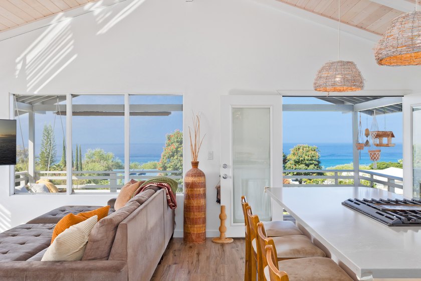 Expansive views! This inviting 3-bedroom, 2-bath home offers - Beach Home for sale in Kailua Kona, Hawaii on Beachhouse.com