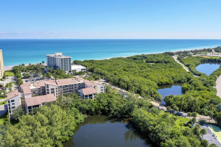 Large corner unit with a spacious screened lanai overlooking a - Beach Condo for sale in Jupiter, Florida on Beachhouse.com