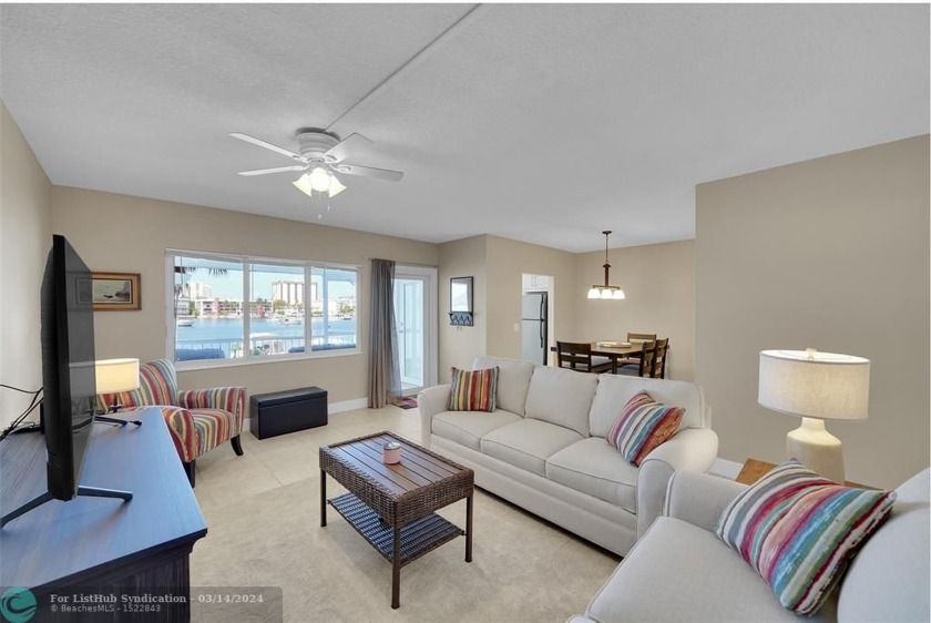 A true gem on tranquil Lake Golden Isles! HURRICANE IMPACT - Beach Condo for sale in Hallandale Beach, Florida on Beachhouse.com