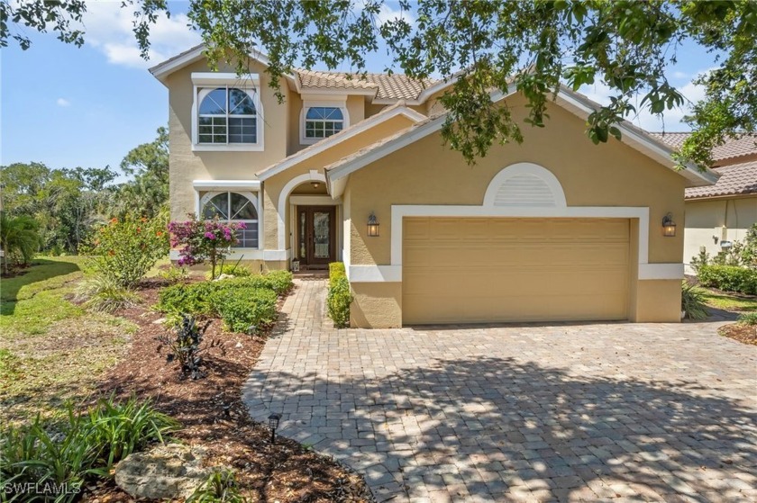 This TWO-STORY home is nestled on a quiet cul-de-sac in the - Beach Home for sale in Bonita Springs, Florida on Beachhouse.com