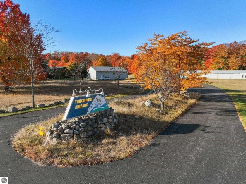 Prime commercial hangar lot, with already poured 50 x 56 cement - Beach Lot for sale in Kewadin, Michigan on Beachhouse.com