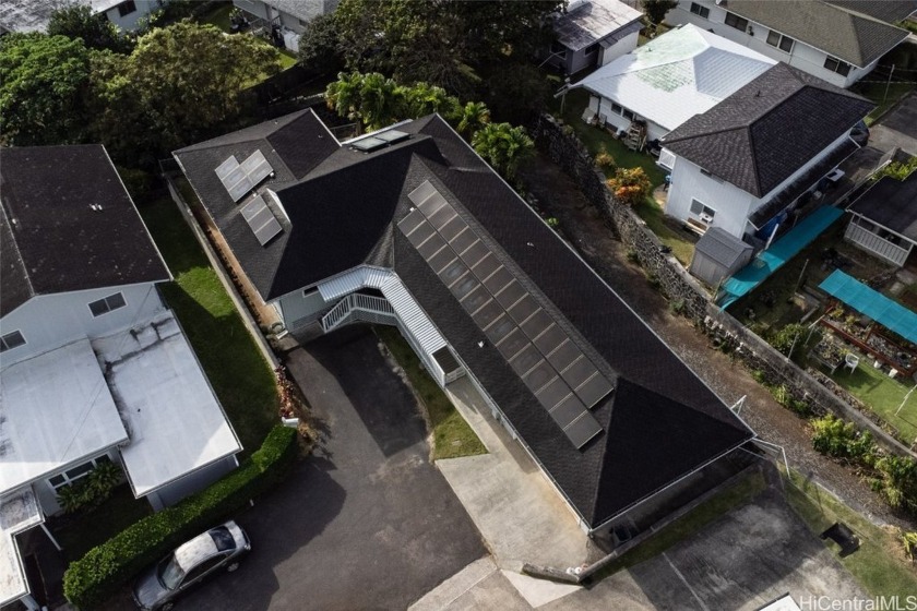 Tucked away in storied Manoa Valley, this beautifully maintained - Beach Home for sale in Honolulu, Hawaii on Beachhouse.com