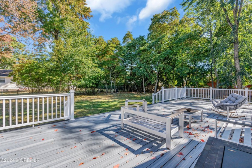 Nestled on a charming, quiet street, this custom-built home sits - Beach Home for sale in Oakhurst, New Jersey on Beachhouse.com