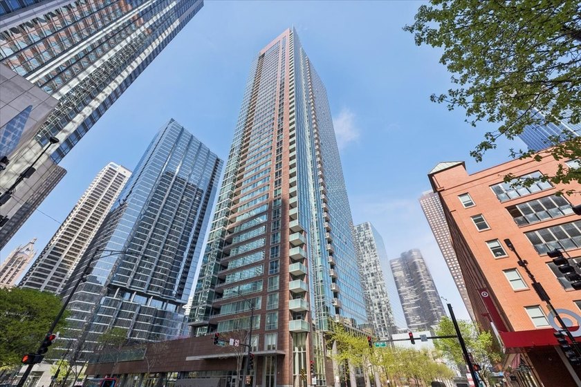 Breathtaking lake, river, and city views await from this premier - Beach Condo for sale in Chicago, Illinois on Beachhouse.com