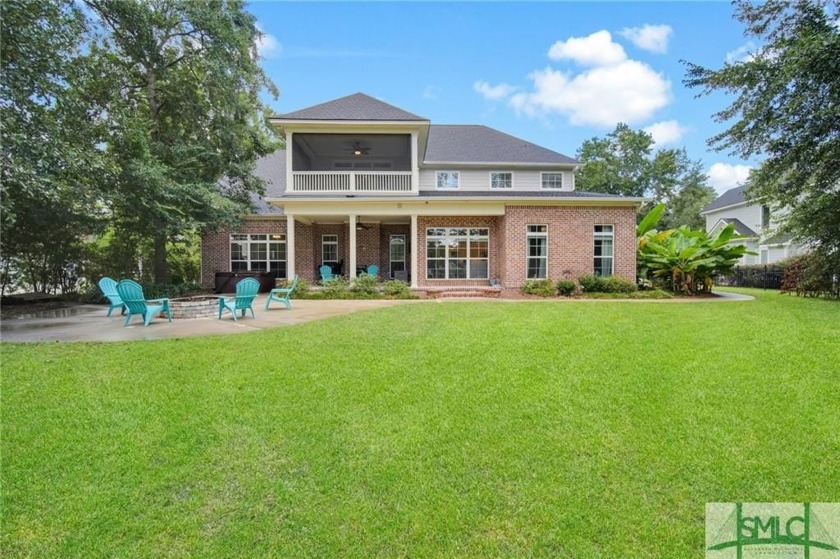 Discover this exceptional 5-bedroom, 5-bathroom estate in the - Beach Home for sale in Richmond Hill, Georgia on Beachhouse.com