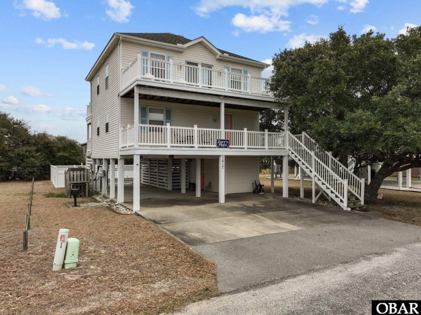 This adorable 1,641 sq. ft. 4BR, 2BA home is situated Between - Beach Home for sale in Kill Devil Hills, North Carolina on Beachhouse.com
