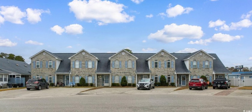 Welcome home to this 3-bedroom, 2-bathroom townhouse in the - Beach Townhome/Townhouse for sale in Little River, South Carolina on Beachhouse.com