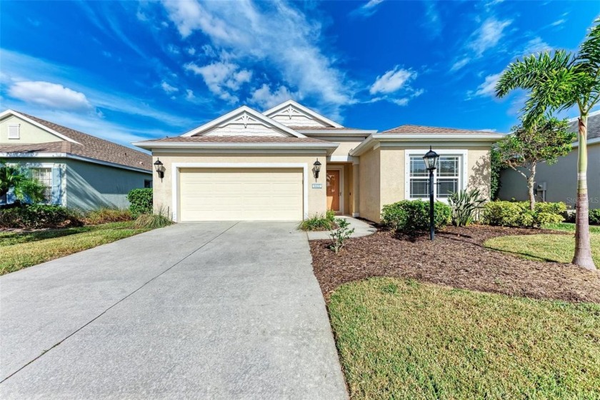 Step into this charming 2 bedroom, 2 bathroom residence situated - Beach Home for sale in Bradenton, Florida on Beachhouse.com