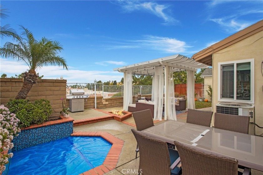 An exquisite 4-bedroom, 3-bathroom residence in the coveted - Beach Home for sale in Mission Viejo, California on Beachhouse.com