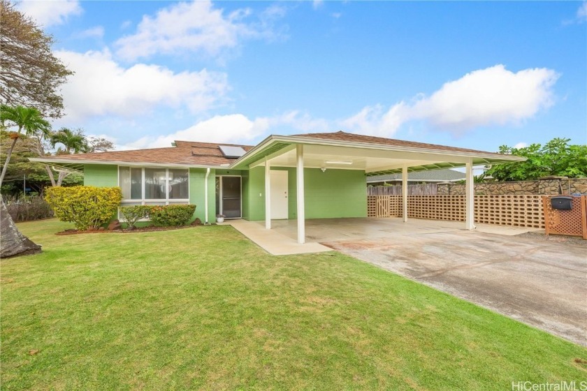 This beautifully maintained 4-bedroom, 2-bath home is located in - Beach Home for sale in Mililani, Hawaii on Beachhouse.com