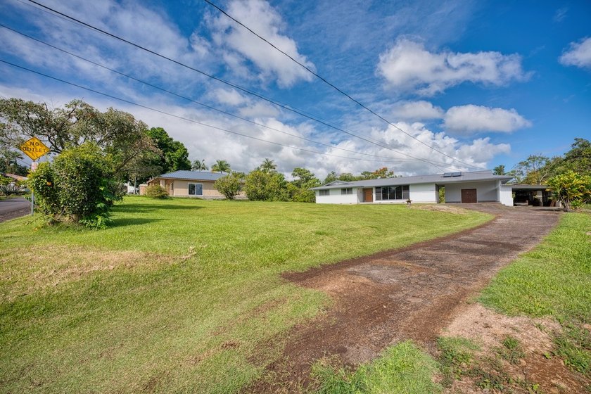 This 4-bedroom, 2.5 bath redwood home, not to mentioning the - Beach Home for sale in Papaikou, Hawaii on Beachhouse.com